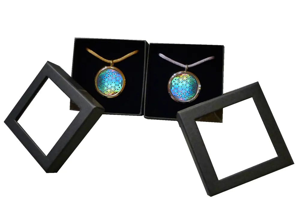 The flower of life as a hologram amulet with pendant in a box